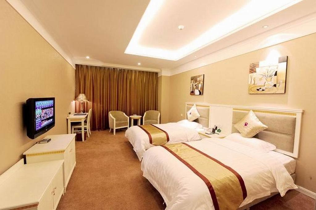 Dragon Hotel Chongqing Quarto foto